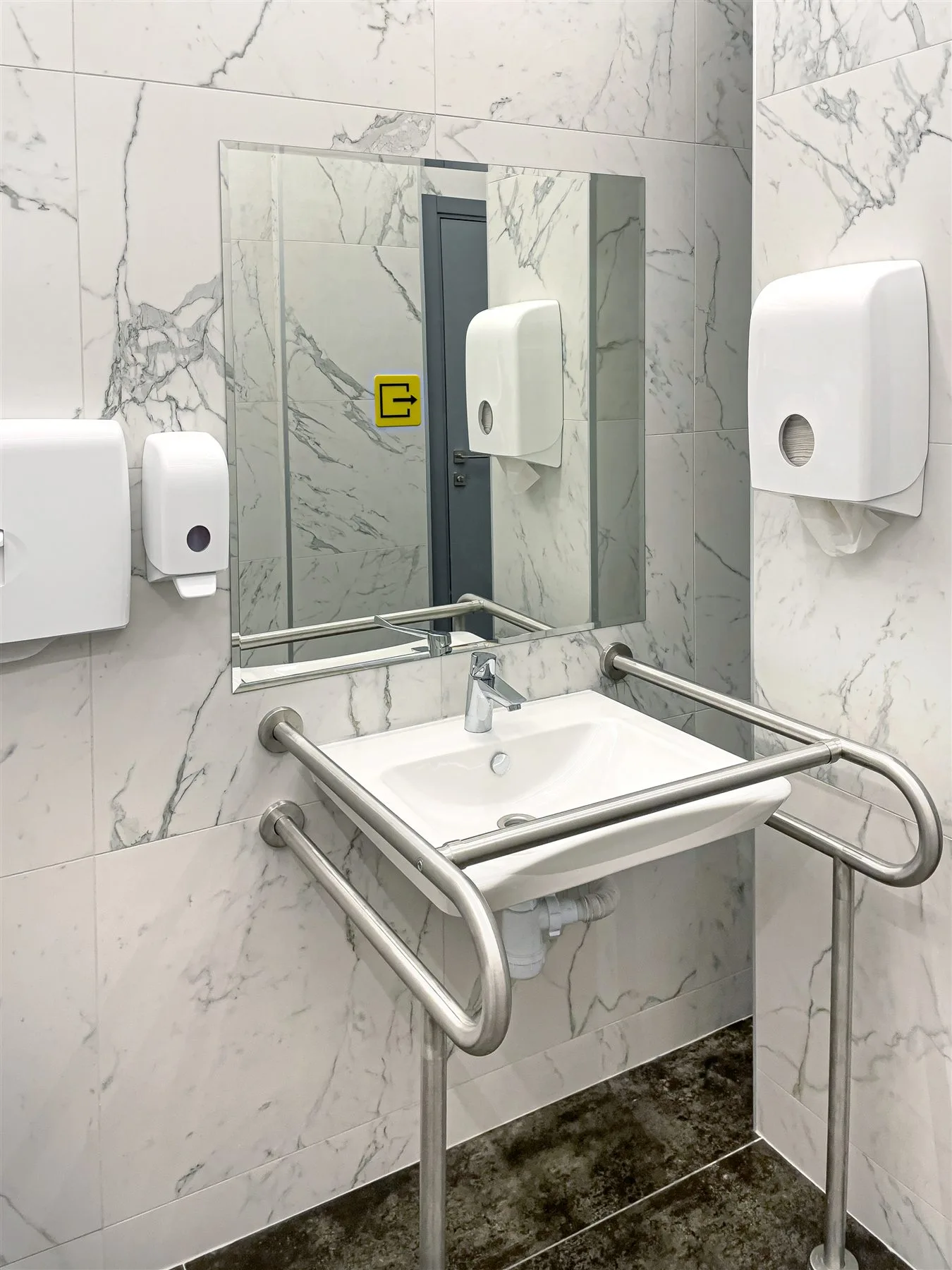 Bathroom shower design reference with seating and support bars