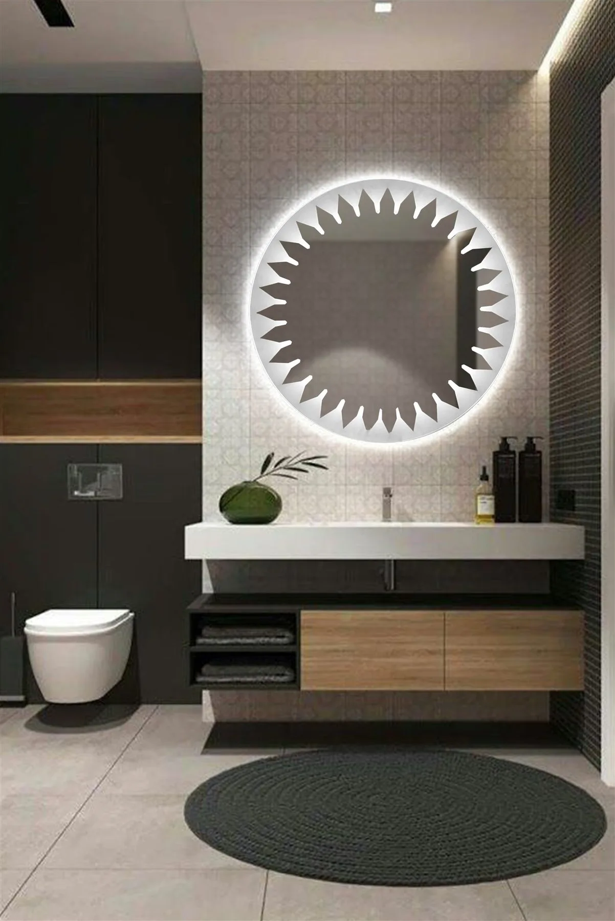 Design reference showing balanced vertical light at a bathroom mirror