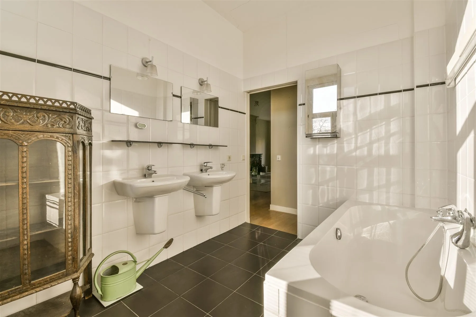 Design reference showing shower glass, fixtures, and surrounding clearances