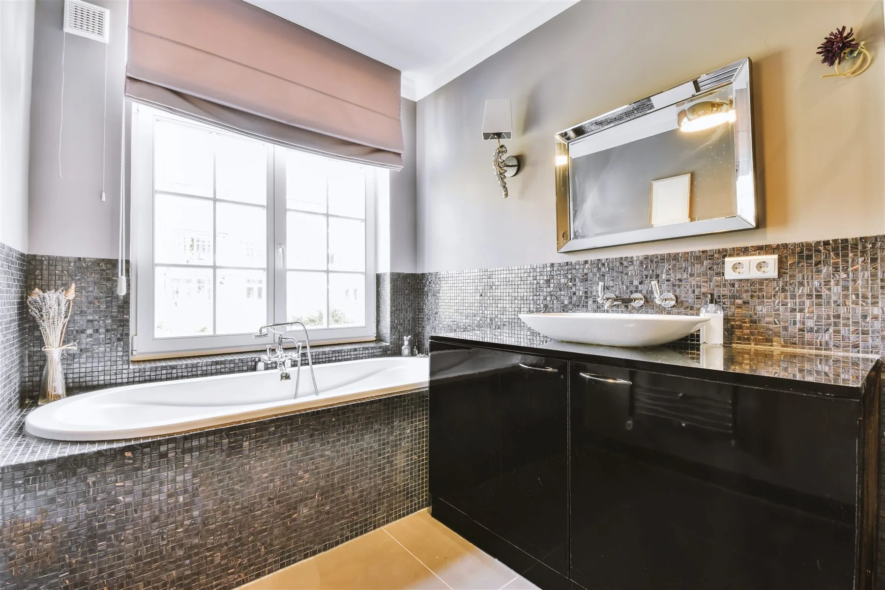 Design reference showing a vanity coordinated with mosaic tile