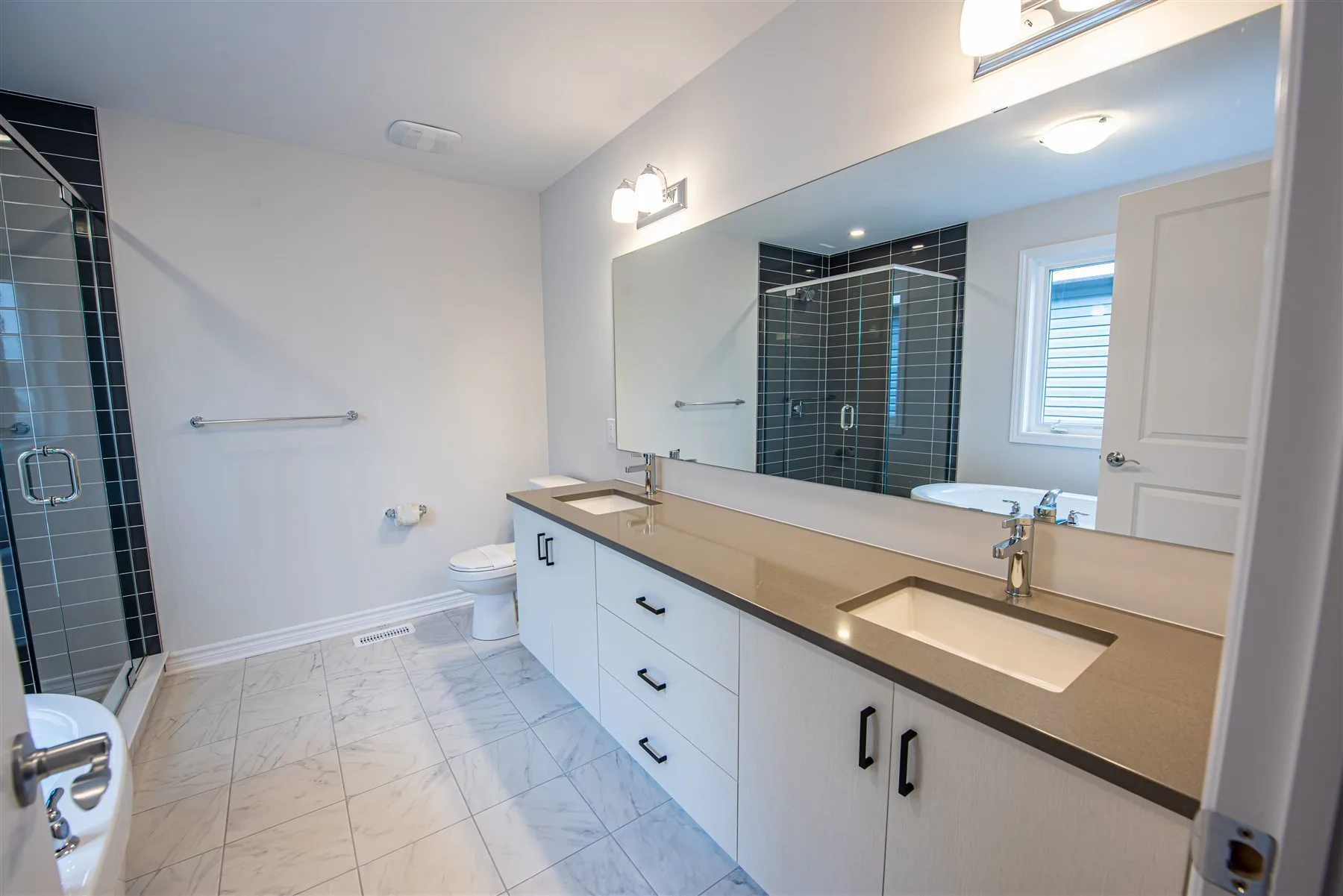 Bathroom storage design reference with practical drawers and cabinetry